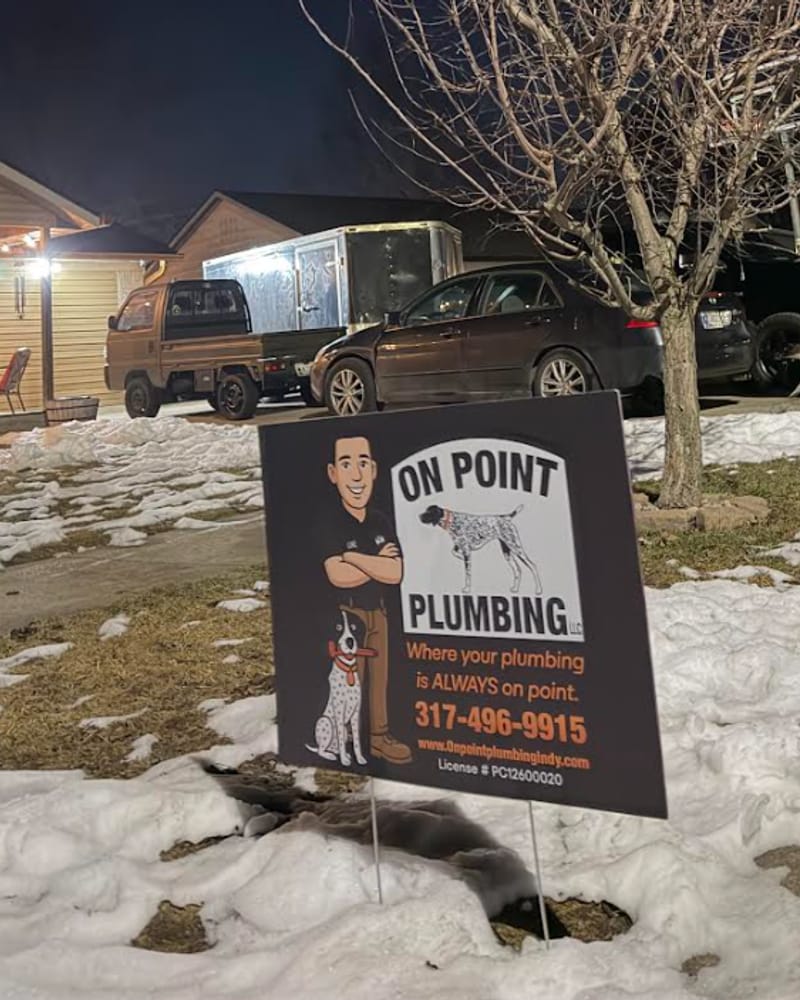 On Point Plumbing yard sign outside a completed job on the Indy southside