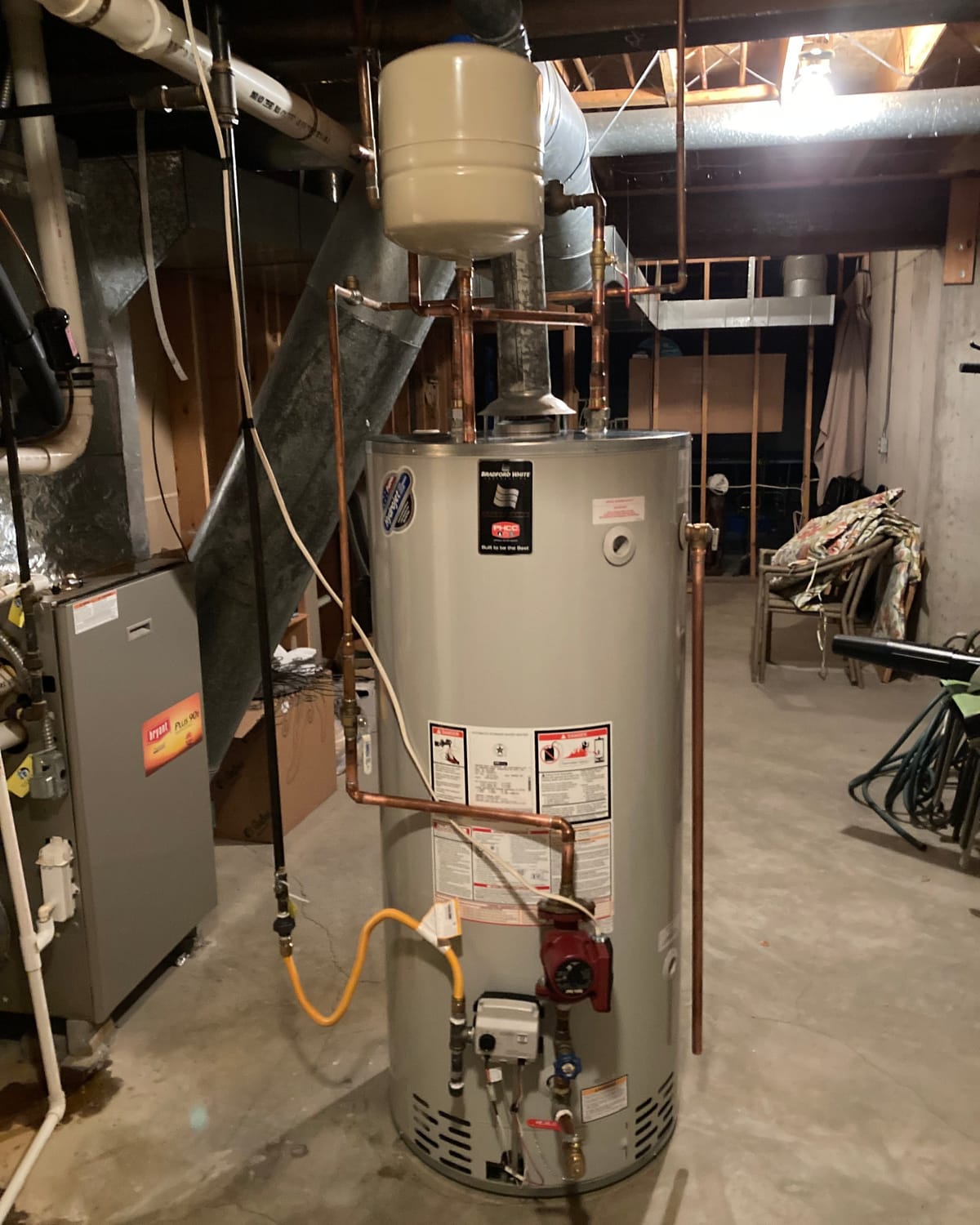 Bradford White tank water heater installed with expansion tank